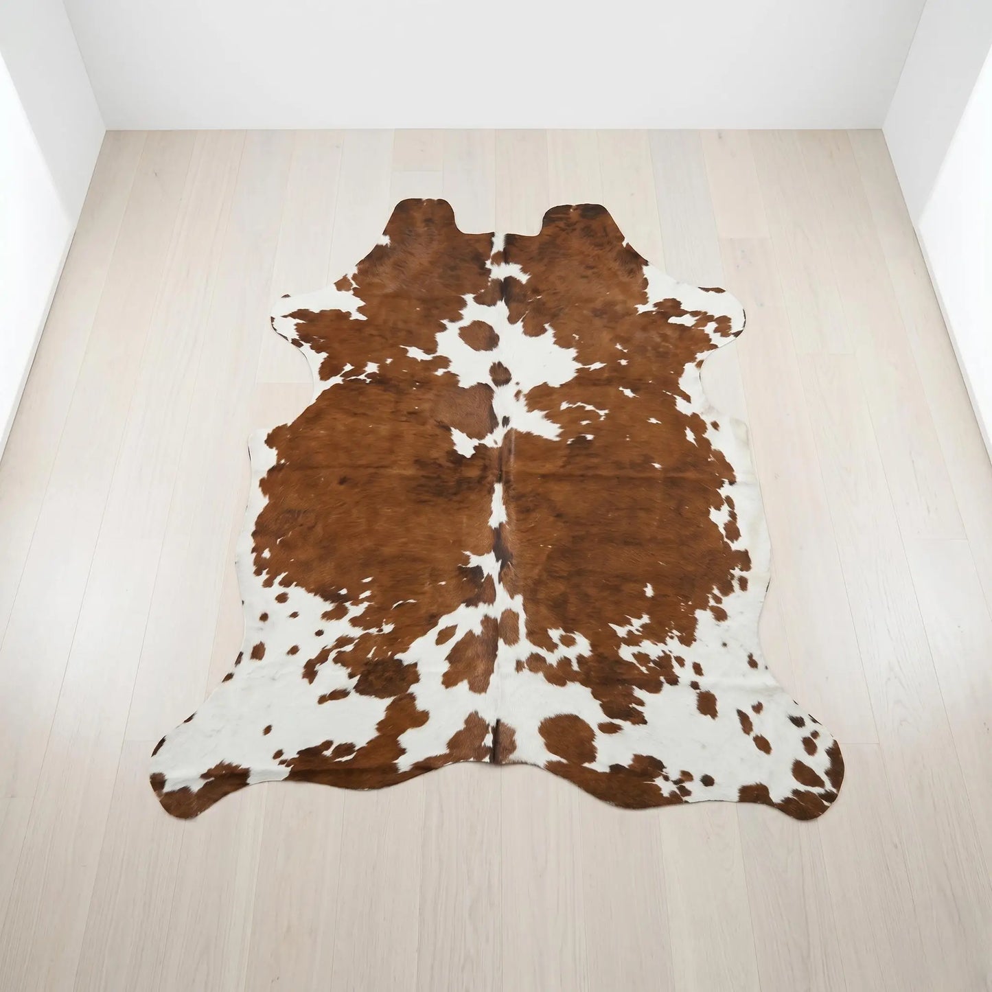 Elevate Your Space with a Genuine, One-of-a-Kind Natural Cowhide Rug