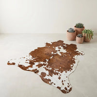 Elevate Your Space with a Genuine, One-of-a-Kind Natural Cowhide Rug