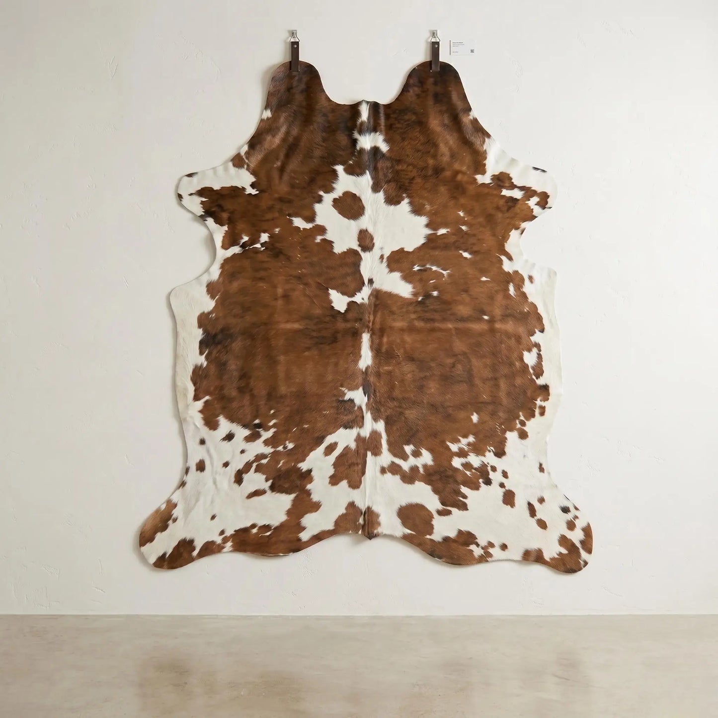 Elevate Your Space with a Genuine, One-of-a-Kind Natural Cowhide Rug