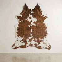 Elevate Your Space with a Genuine, One-of-a-Kind Natural Cowhide Rug