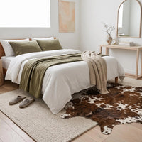 Transform Your Space with the Timeless Elegance of a Genuine Tricolor Cowhide Rug