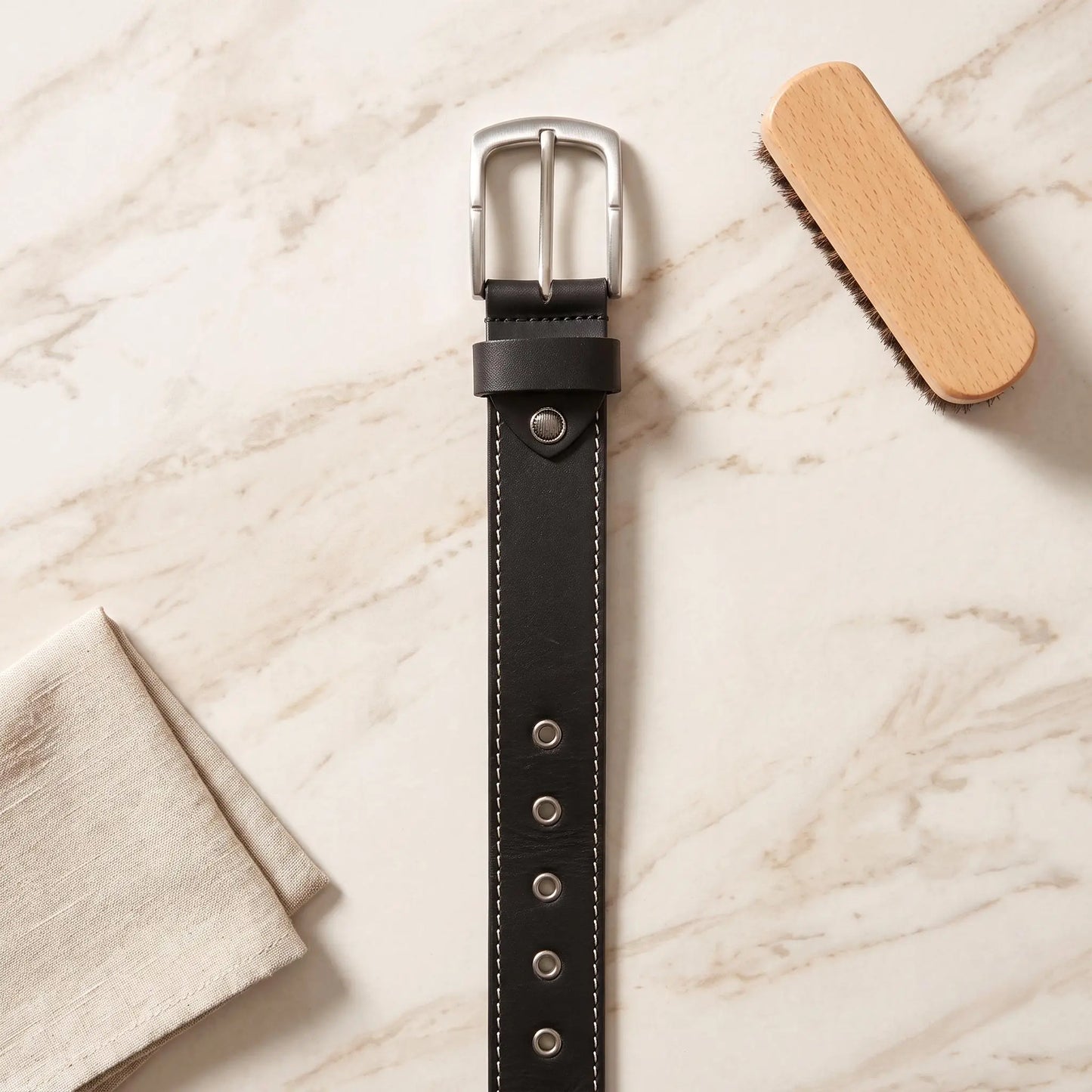 Unbridled Attitude: Handcrafted Skull Studded Leather Belt