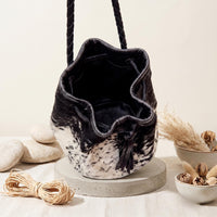 Natural Black & Cream Speckled Hair-On Cowhide Drawstring Bucket Bag
