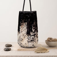 Natural Black & Cream Speckled Hair-On Cowhide Drawstring Bucket Bag