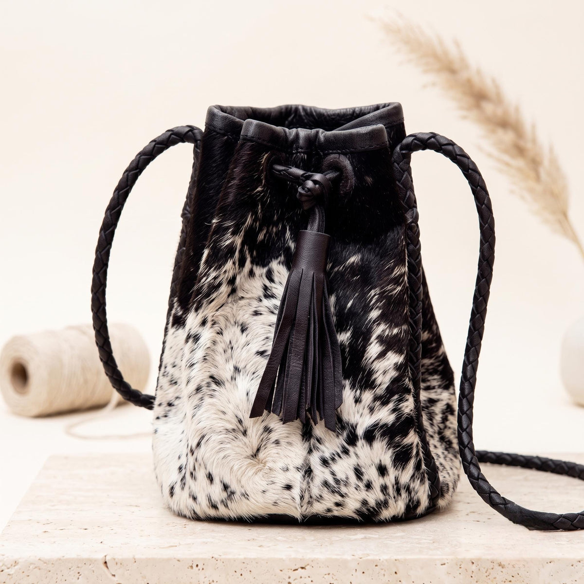 Natural Black & Cream Speckled Hair-On Cowhide Drawstring Bucket Bag